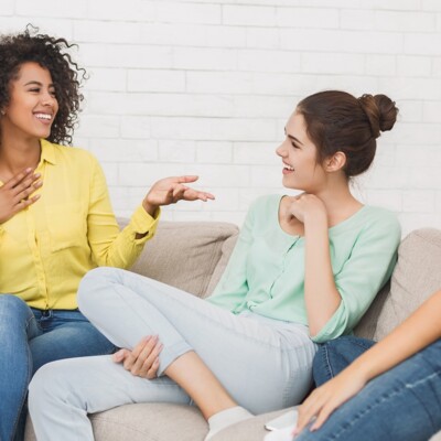 Lights in the Darkness | The Navigators Collegiate Ministry | Happy friends chatting at home, having friendly talk