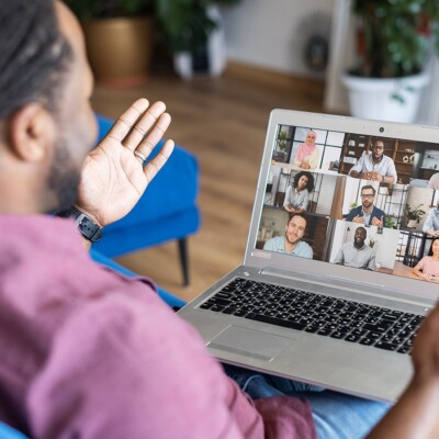 A man on a web call engaging in a discipleship learning community online.
