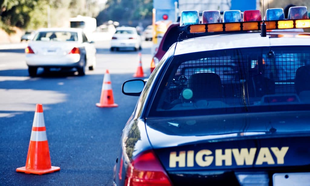 Crash and Christ | Navigators Responders | Parked police car on the side of the road